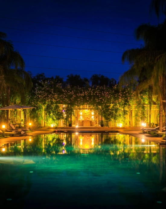 Luxury hotel with at pool at night